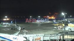 Five dead as planes collide on runway at Tokyo's Haneda Airport - AFP