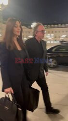 *EXCLUSIVE* Monica Bellucci and Tim Burton get out of a taxi and enter the Ritz hotel in Paris.