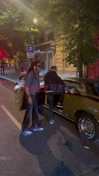 *EXCLUSIVE* The American Rocker Lenny Kravitz steps into his flash gold car in true rock star style with a mystery woman out in Paris, France.