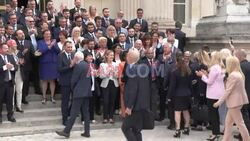 RN MPs pose for a group photo on the Palais Bourbon steps - AFP