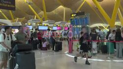 People queuing in Madrid as Spanish airports impacted by IT outage - AFP