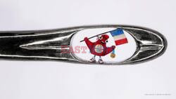 Microscopic Artist Willard Wigan Creates Paris 2024 Olympic Mascot In The Eye Of A Needle