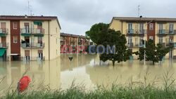 Italy rescuers deliver supplies by boat as flooding strands residents - AFP