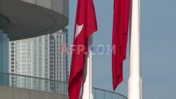 Hong Kong holds flag-raising ceremony to mark 75th anniversary of People's Republic of China - AFP