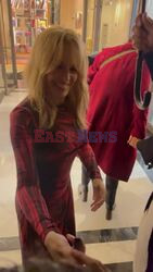 *EXCLUSIVE* The Australian Pop Princess Kylie Minogue signs a few autographs as the star is all smiles spotted out in Paris, France.