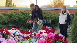 Mourners gather at Navalny's grave ahead of memoir release - AFP