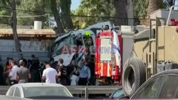 Scene after truck hits bus stop in Israel - AFP