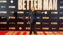 British popstar Robbie Williams and the director Michael Gracey attend the 'Better Man' photocall in Rome