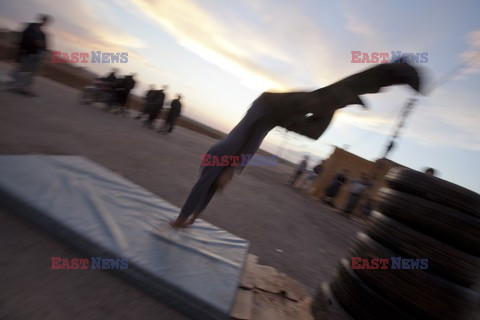 Free Syrian Army youth soldiers attend a training camp 