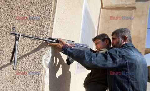 Free Syrian Army youth soldiers attend a training camp 