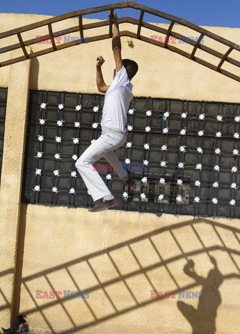 Free Syrian Army youth soldiers attend a training camp 