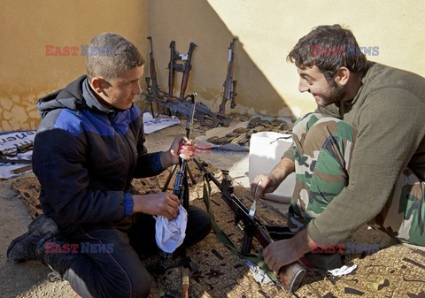 Free Syrian Army youth soldiers attend a training camp 