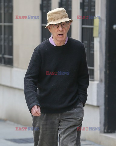 Woody Allen and wife Soon-Yi Previn hold hands 