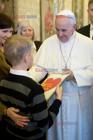 Pope Francis meets a group of sick children