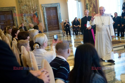 Pope Francis meets a group of sick children