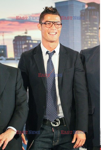 Cristiano Ronaldo smiles after signing the renewal of his contract 