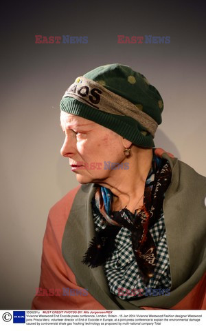 Vivienne Westwood wearing a hat with Chaos 