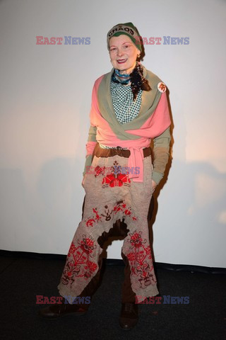 Vivienne Westwood wearing a hat with Chaos 