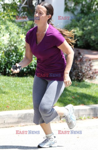 Alanis Morissette jogging around her neighborhood