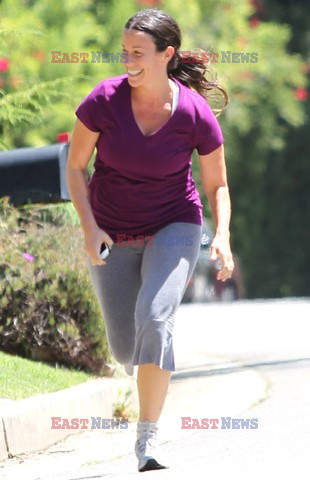 Alanis Morissette jogging around her neighborhood