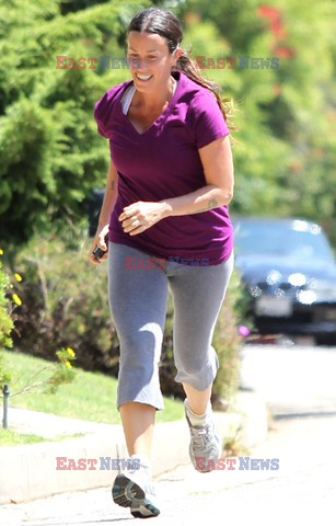 Alanis Morissette jogging around her neighborhood