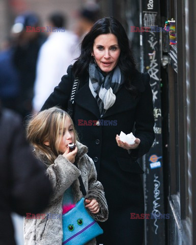 Courteney Cox and her daughter taking a walk