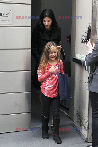 Courteney Cox and her daughter taking a walk