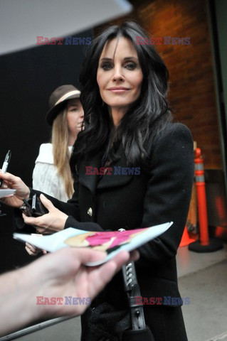 Courteney Cox and her daughter taking a walk