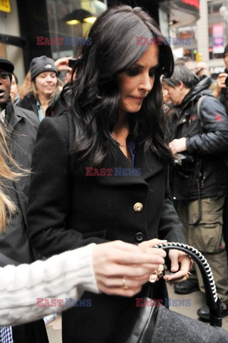 Courteney Cox and her daughter taking a walk