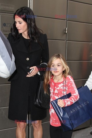 Courteney Cox and her daughter taking a walk