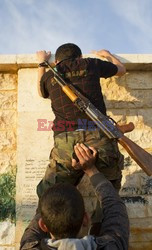 Free Syrian Army youth soldiers attend a training camp 