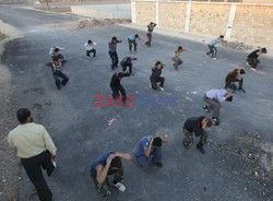 Free Syrian Army youth soldiers attend a training camp 