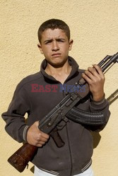 Free Syrian Army youth soldiers attend a training camp 