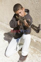 Free Syrian Army youth soldiers attend a training camp 