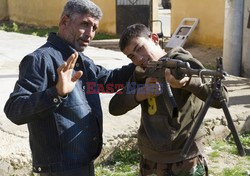 Free Syrian Army youth soldiers attend a training camp 