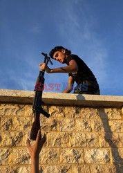 Free Syrian Army youth soldiers attend a training camp 