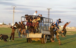 Free Syrian Army youth soldiers attend a training camp 