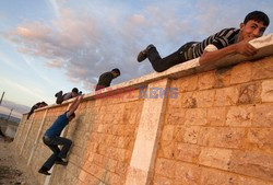 Free Syrian Army youth soldiers attend a training camp 