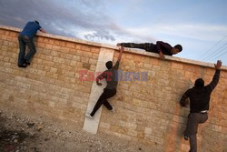 Free Syrian Army youth soldiers attend a training camp 