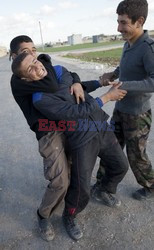 Free Syrian Army youth soldiers attend a training camp 