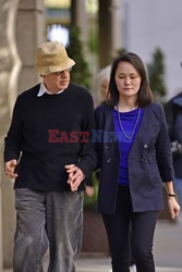 Woody Allen and wife Soon-Yi Previn hold hands 