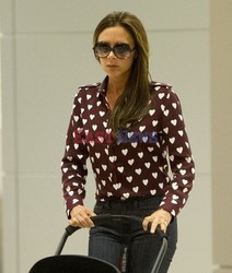 Victoria Beckham z Harper na lotnisku