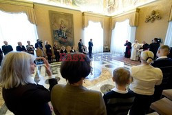 Pope Francis meets a group of sick children