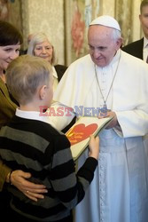 Pope Francis meets a group of sick children