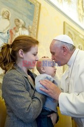 Pope Francis meets a group of sick children