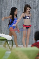 Katie Holmes and Suri Cruise wear bikinis 