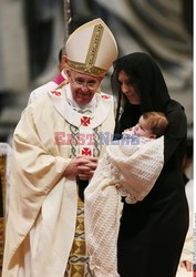 Pope Francis burns incense for a statue of the Virgin Mary