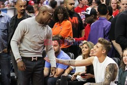 Celebrities watching NBA