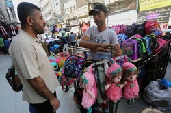 Palestyńczycy przygotowują dzieci do nowego roku szkolnego