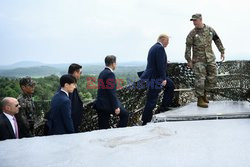 Donald Trump i Kim Dzong Un w strefie zdemilitaryzowanej